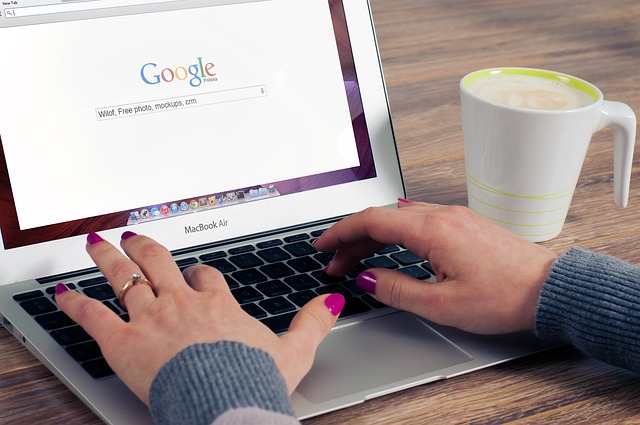 An image that showcases a mobile phone with a search engine results page displayed on its screen, surrounded by various mobile devices (smartphones, tablets) emphasizing the significance of Mobile SEO